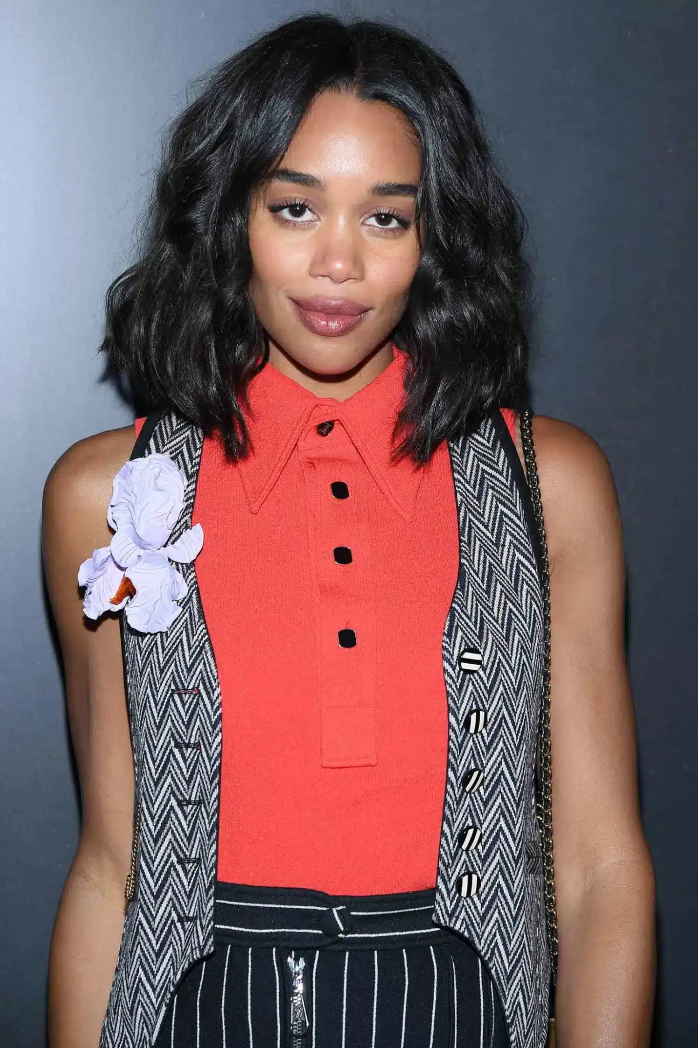 Laura Harrier wearing a wavy lob featured in 35+ Polished Low-Maintenance Medium-Length Haircuts
