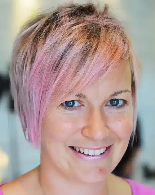 Pink pixie cut with shadow roots
