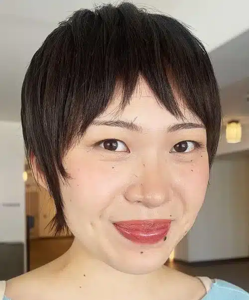 Pixie cut with bottleneck bangs