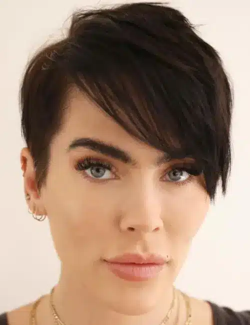 Pixie cut with long asymmetrical bangs